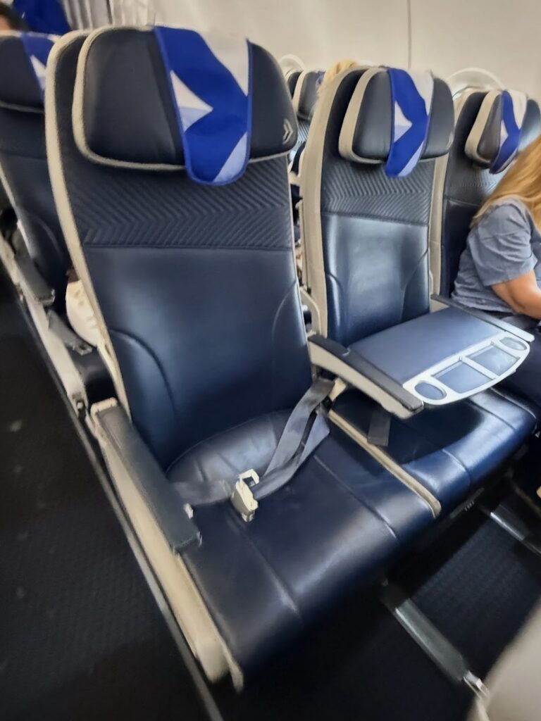Aegean Airlines business class seats with blue headrests