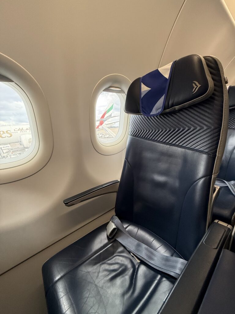 Aegean Airlines business class seat with window view at Athens