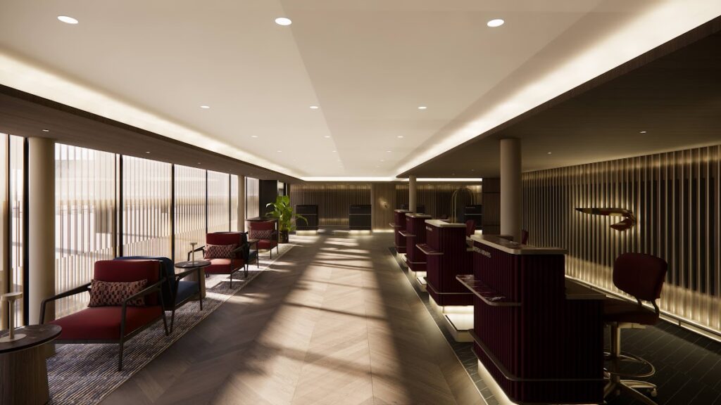 Lounge seating area with burgundy chairs and ambient lighting